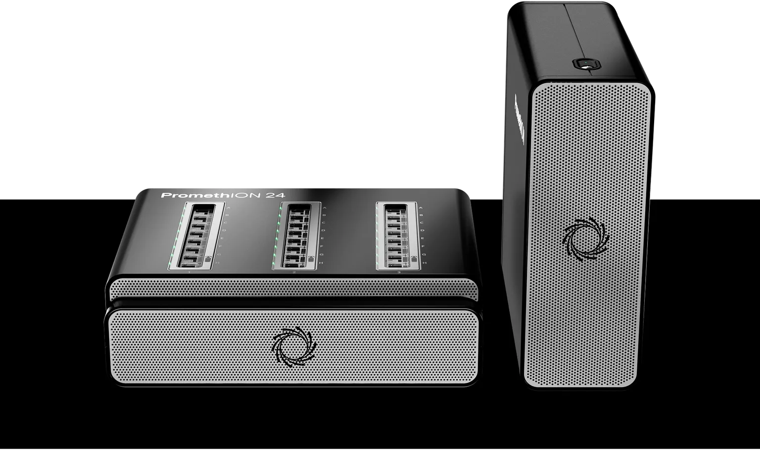 Front, elevated view of a PromethION 24 sequencing device with compute tower on a black background