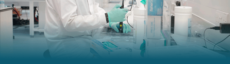 Scientist loading a flow cell